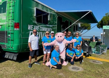 Team Mainstreet employees at RV for Pig On The Pond.